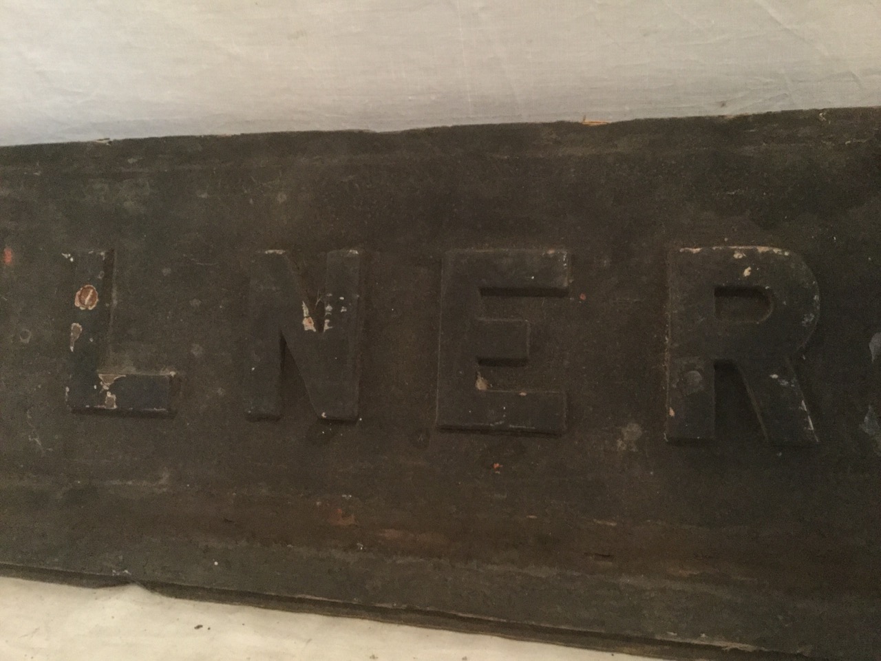 A rectangular wood sign, LNER with raised lettering. (28in) - Image 2 of 3