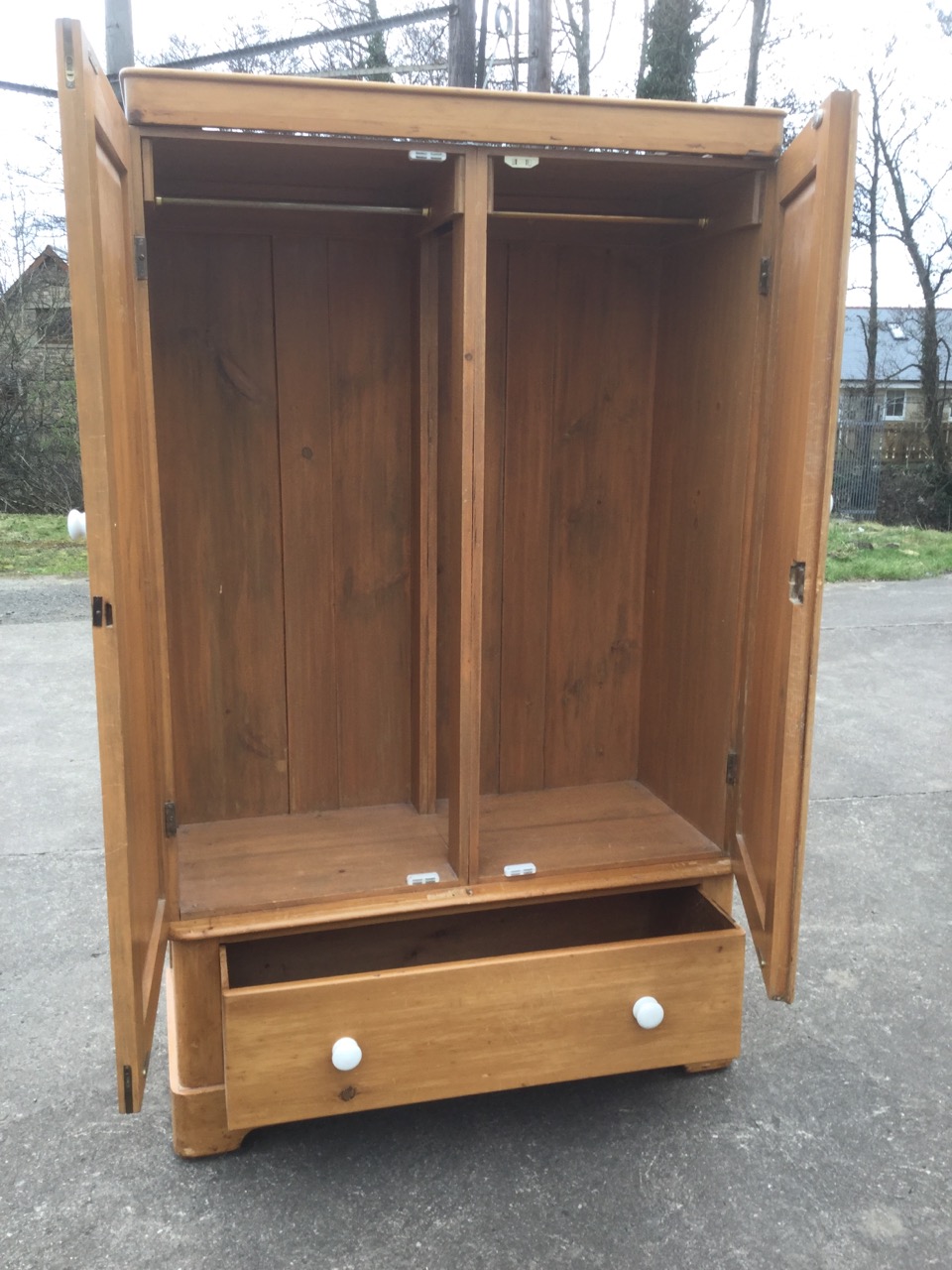 A Victorian pine wardrobe, having plain cornice above a pair of arched panelled doors mounted with - Image 3 of 3