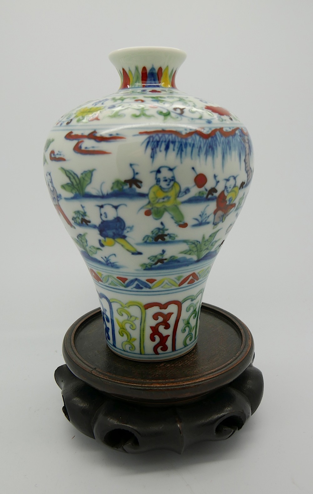 A Chinese doucai vase of bulbous form with Chenghua six character mark to base, the tapering