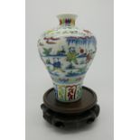 A Chinese doucai vase of bulbous form with Chenghua six character mark to base, the tapering