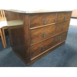 A Victorian mahogany chest of drawers, with rounded moulded top above two short and two long drawers