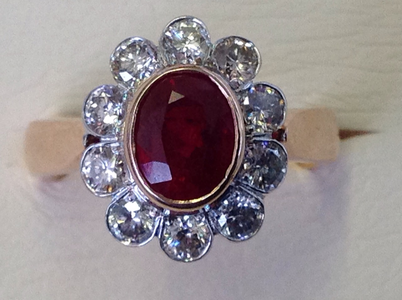 A hallmarked 18ct rose gold ruby & diamond ring, the oval bezel set ruby of over one-and-a-half - Image 2 of 3