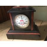 A Victorian slate & marble mantle clock of architectural form, with rouge panels and foliate