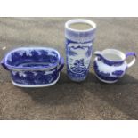 Three large pieces of blue & white - a tubular chinoiserie stickstand, a footbath with landscape