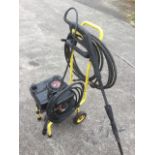 A Karcher 3.8HP petrol power washer on trolley stand.