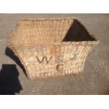 A large rectangular cane log basket.