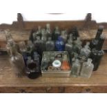 A collection of 'dug' bottles & pots - beer, medicine, several named, ink, etc. (A lot)
