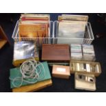 A collection of various 35mm slides contained in wood boxes & carousels; a collection of vinyl LPs -