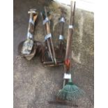 Miscellaneous garden tools including rakes, shovels, grass edgers, hoes, spades, a fork, etc. (A