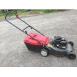 A Mountfield classic 35 petrol lawnmower.