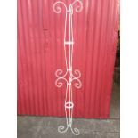 A 5ft 6in garden stand, designed for creepers, with scrolled decoration to column.