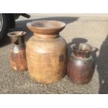 Three turned hardwood pots, the vessels with decorative bands, having flared rims. (3)