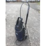 A Macallister electric pressure washer, the lance with brush attachment.