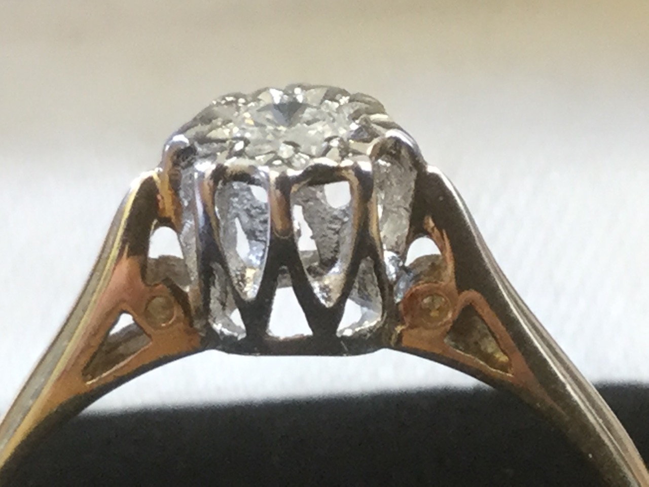 A 9ct gold diamond ring, the crown set brilliant cut circular stone raised in a white gold cage, - Image 3 of 3