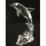 A Swarovski dolphin with certificate and presentation case - cost £350. (8in)