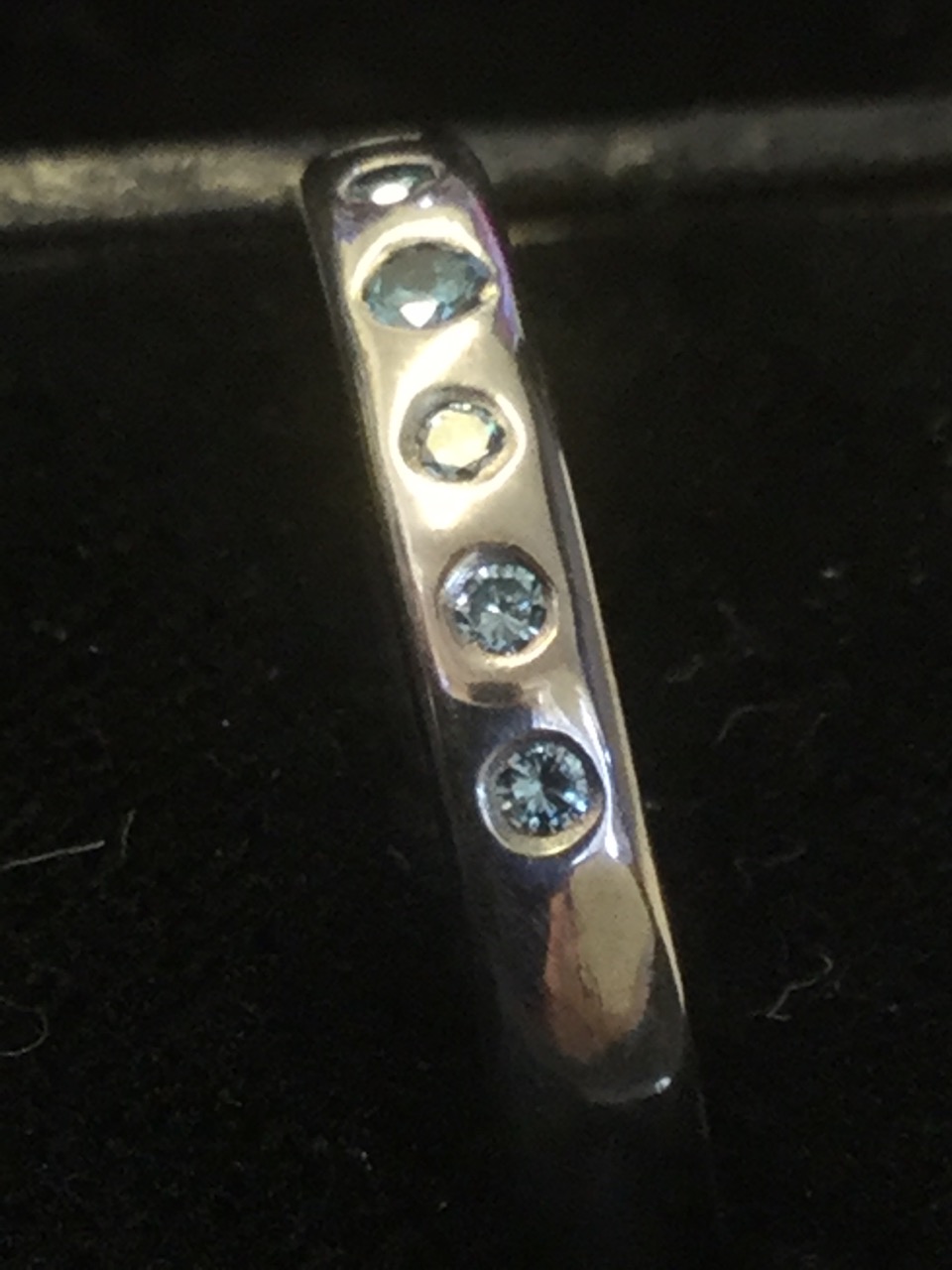 A platinum ring set with seven blue stones - untested. - Image 3 of 3