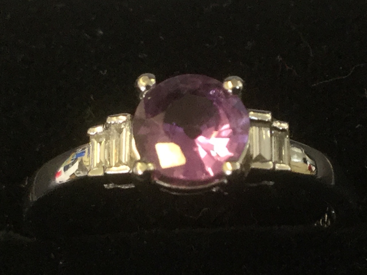 An 18ct gold purple sapphire & diamond ring, the circular sapphire of 0.80 carats, above shoulders - Image 2 of 3