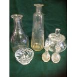 A Georgian decanter with ribbed neck and faceted shoulders; a pair of cut glass scent bottles &