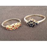 A 9ct gold hallmarked ring claw set with six garnets; and another hallmarked ring set with diamond