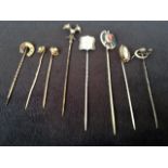 Eight gold, silver and metal stick pins - paste diamonds, opal, Scottish polished pebble, horseshoe,