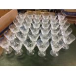 A set of 35 Stuart cut crystal wine glasses. (35)