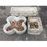 Three composition stone garden pots-quatrefoil with stone wall effect, rectangular with brick