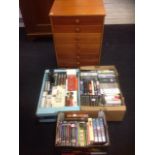 A cherrywood cabinet of drawers containing a large collection of CDs - classical, opera, folk, jazz,