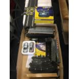 A boxed Scalextric set including two cars, circuit track, a lap counter/ timer, etc. (A lot)