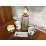 Five Scottish Border items - a Crown Devon Kelso cup, a Galashiels Middlemas glass soda syphon, a