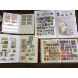 A 'schoolboy' stamp collection contained in four albums, together with a bag of loose stamps. (A