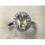 A rare 18ct gold yellow sapphire & diamond ring, the claw set sapphire of over one and a quarter