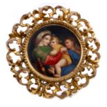 Late 19th century Continental porcelain circular plaque painted with Madonna and Child,