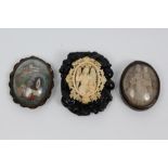 19th century Continental carved ivory and ebony brooch,