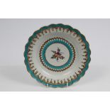 18th century Worcester plate with central polychrome floral spray within gilt and turquoise borders