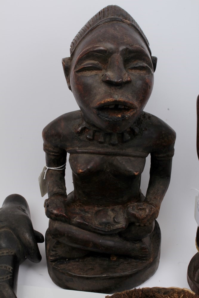 Group of African tribal sculptures including metal and shell mounted Dan mask, - Image 2 of 5