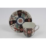 18th century Worcester Queens pattern faceted chocolate cup and saucer with Imari palette floral