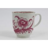 18th century Worcester coffee cup with puce monochrome flowers and fluted loop handle.