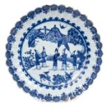 Mid-18th century Chinese export blue and white porcelain fluted dish painted with courtiers,