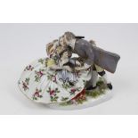 19th century German Meissen-style porcelain figure group of an affectionate family,