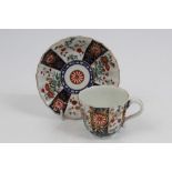 18th century Worcester Queens pattern faceted coffee cup and saucer with Imari palette floral and