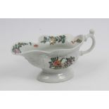 18th century Worcester porcelain pedestal sauce boat with moulded floral scrolls and cartouches and