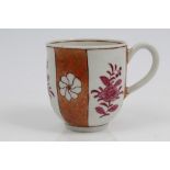 18th century Worcester coffee cup with segmented painted puce floral sprigs,