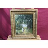 English School oil on canvas - figures in a rural lane, signed with initials, in gilt frame,