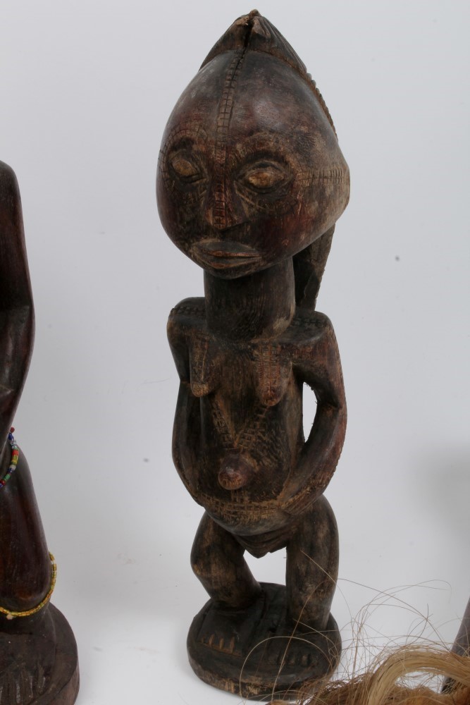 Group of African tribal sculptures including metal and shell mounted Dan mask, - Image 4 of 5