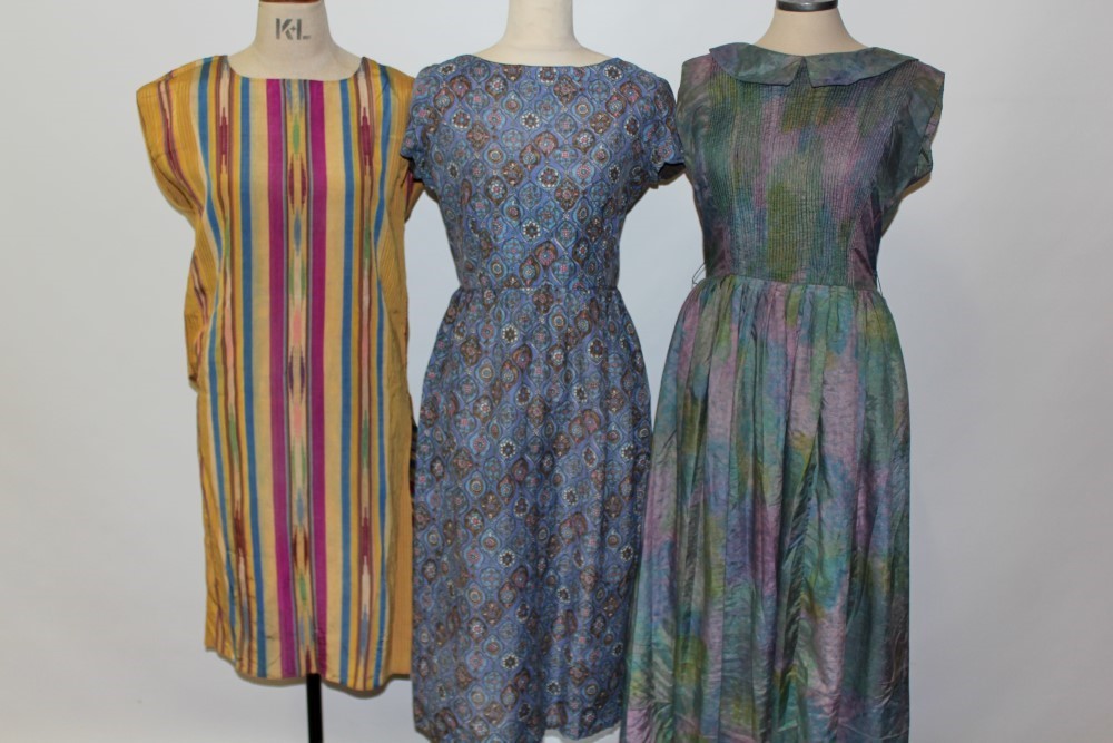 Two ladies' 1950s vintage day dresses, plus a quantity of 1970s maxi dresses and skirts,