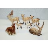 Seven Beswick animal models - Deer on base 721, Stag lying down, Stag standing,