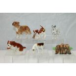 Six Beswick dogs - Dalmatian, Staffordshire Bull Terrier, 'Play Time', 'Caught It',