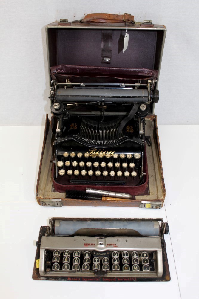 Vintage 'Bijou' typewriter in original leather case with stationery pockets,