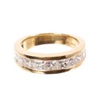 Gold (18ct) diamond half eternity ring with a band of twelve princess cut diamonds estimated to