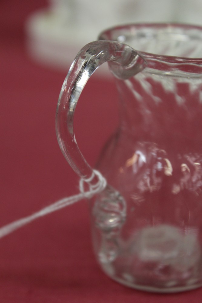 Two Georgian glass cream jugs with spiral-twist decoration, fold-over rims and loop handles, 8. - Image 14 of 16